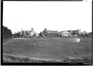 View of buildings on the UCLA campus from across an open field