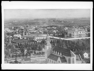 Pershing Square (formerly 6th Street park) looking southeast from Normal School (the present site of the Biltmore Hotel) showing St. Paul’s Cathedral and First Methodist Episcopal Church, ca.1883