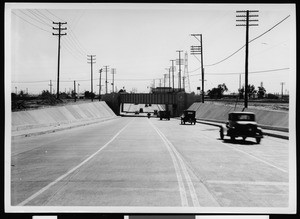 Railroad bridge grade separation on an unknown street, ca.1930-1939