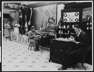 Chamber of Commerce exhibit, where you can have your profile carved in soap for 50 cents, ca.1930