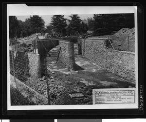 Flood control on the San Jose Creek, showing the construction of a rubble channel, 1943