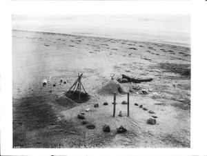 Reconstruction by Dr. Palmer of a prehistoric Indian house and place of worship, California, ca.1900-1930