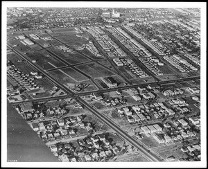 Aerial view from Pico Boulevard to Olympic Boulevard and beyond to La Cienega Boulevard, ca.1930