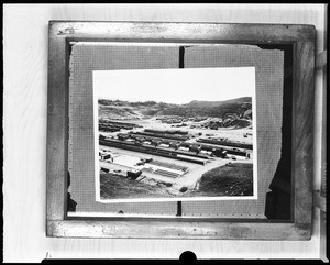 Aerial view of Dodger Stadium under construction in Chavez Ravine, 1960