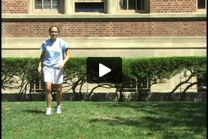 A young female soccer player receiving inside right foot, then turning right