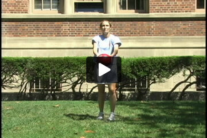 A young female soccer player wedging outside right foot