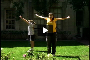 A young females warming up, arm circles