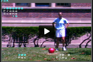 A young female soccer player passing outside the right foot