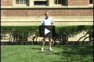 A young female soccer player wedging outside right foot, turning, and passing right