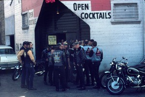 Motorcycle club members outside the On the Levee bar