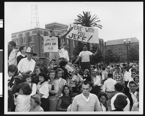 Students with signs supporting University of Southern California football coach Jeff Cravath, USC campus, 1950