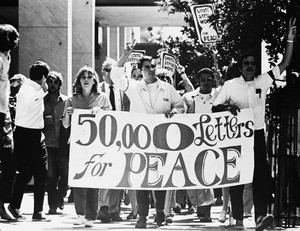 Students and faculty participating in a peace march, USC, 1970