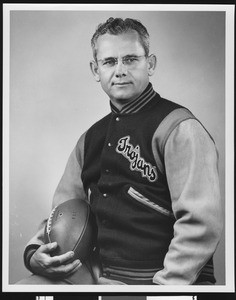 University of Southern California head football coach Jess Hill, studio shot in letter jacket, 1951