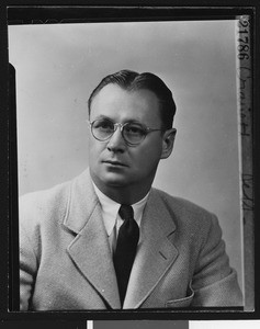 University of Southern California head football coach Jeff Cravath in a studio shot, light suit coat and solid tie. Los Angeles, 1945