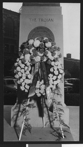 The funeral wreath of University of Southern California assistant football coach Sam Barry, at the base of the Trojan Shrine, USC campus, 1950