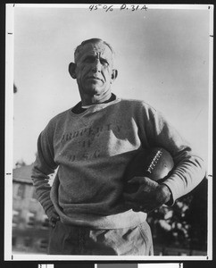 University of Southern California football coach Howard Jones, in grey sweatshirt, face shot, mid 1930s