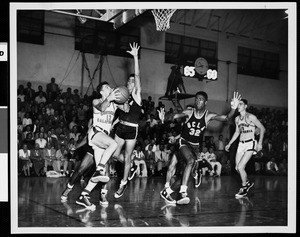 Court-side view of a University of Southern California basketball game, USC vs. UCLA