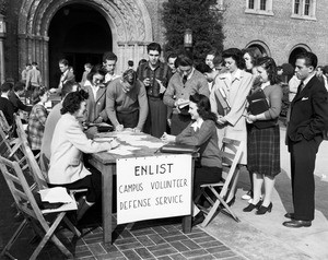 Students, both men and women, waiting in line to sign up for the Campus Volunteer Defense Service, USC, 1941