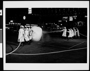 Two teams playing the fire-house-and-ball game