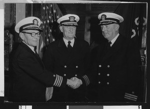 Three University of Southern California assistant football coaches in military uniforms, USC campus, late 1950s