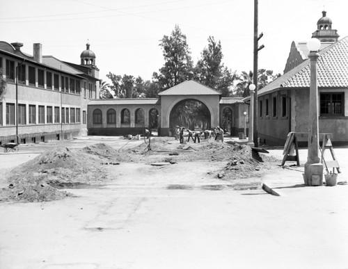 Students repairing road on Sherman campus