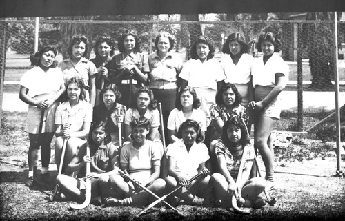 Group portrait of field hockey players