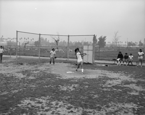 Playing baseball