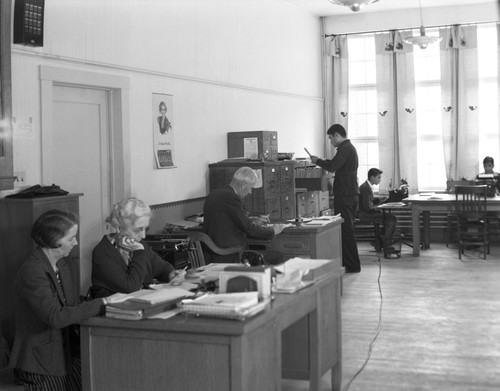 Faculty members working in an office