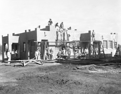 Students constructing building