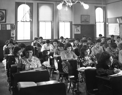 Students reading at their desks