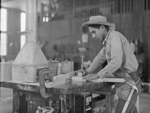 Student working in woodshop