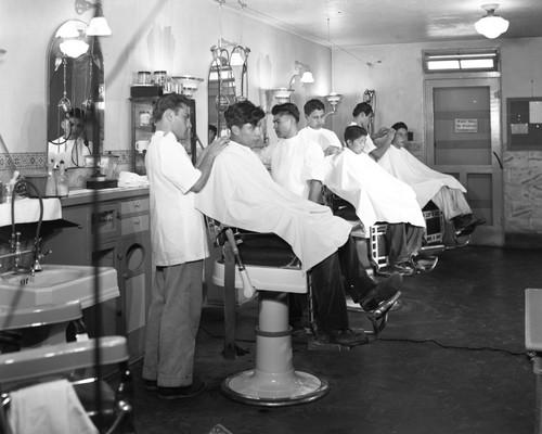 Students working in barbershop