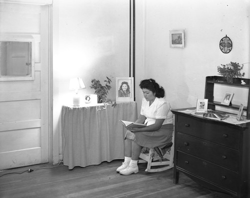 Student reading in bedroom