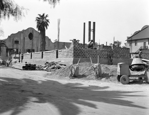 Students working on construction of building