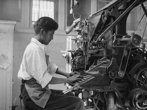 Student working in school print shop