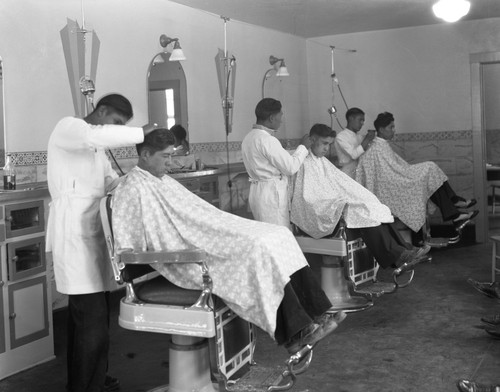 Students working in barbershop