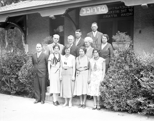 Faculty members in front admininstration office