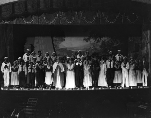 Group portrait of students in play