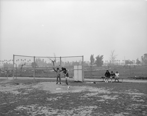 Playing baseball