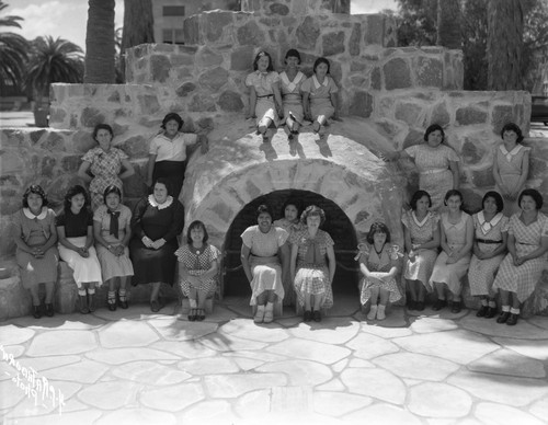 Students gathered around fire pit