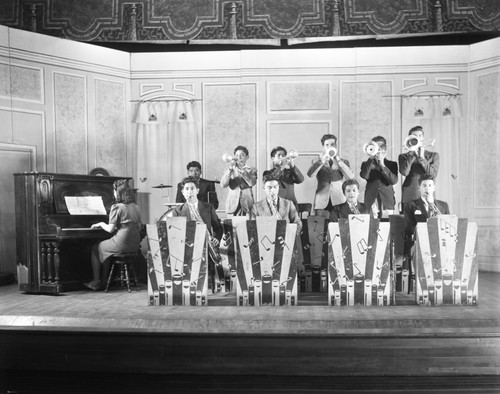 Musicians perform on stage in Conser Auditorium