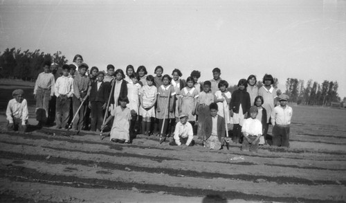 Group portrait of students on school farm