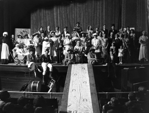 Group portrait of students in play