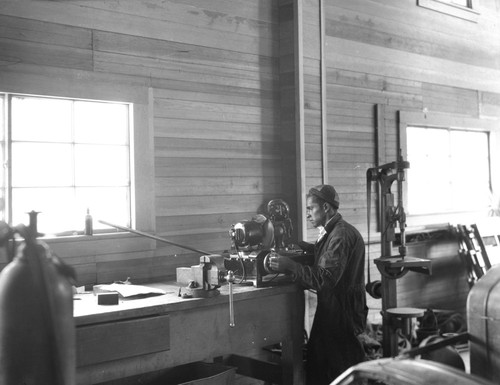 Student working in machine shop