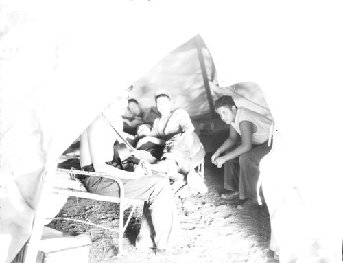 Students socializing in tent