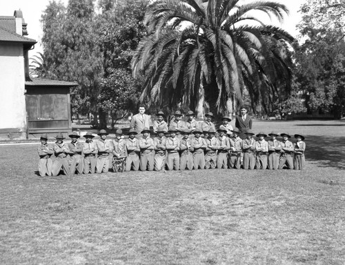 Boy Scouts pose for photograph with their leaders