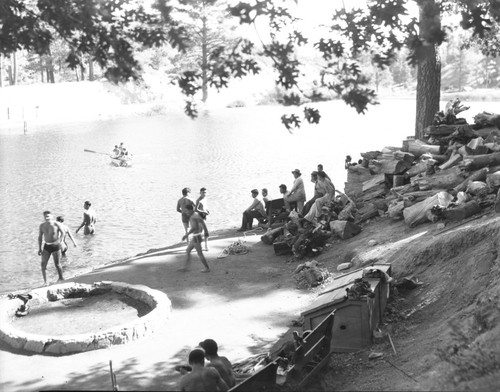 Students playing at lake