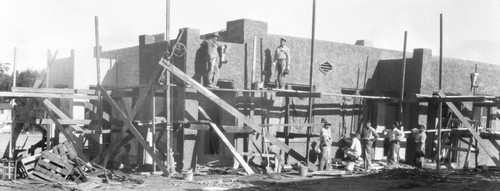 Students constructing building