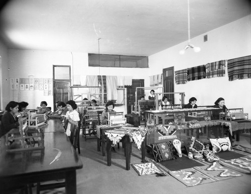 Students work on craft projects in classroom