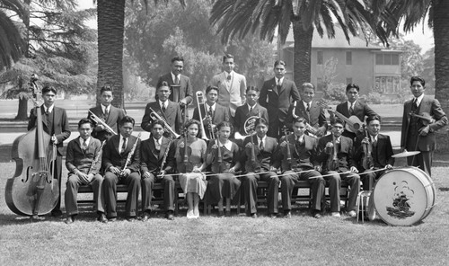 Members of an orchestra pose for photograph